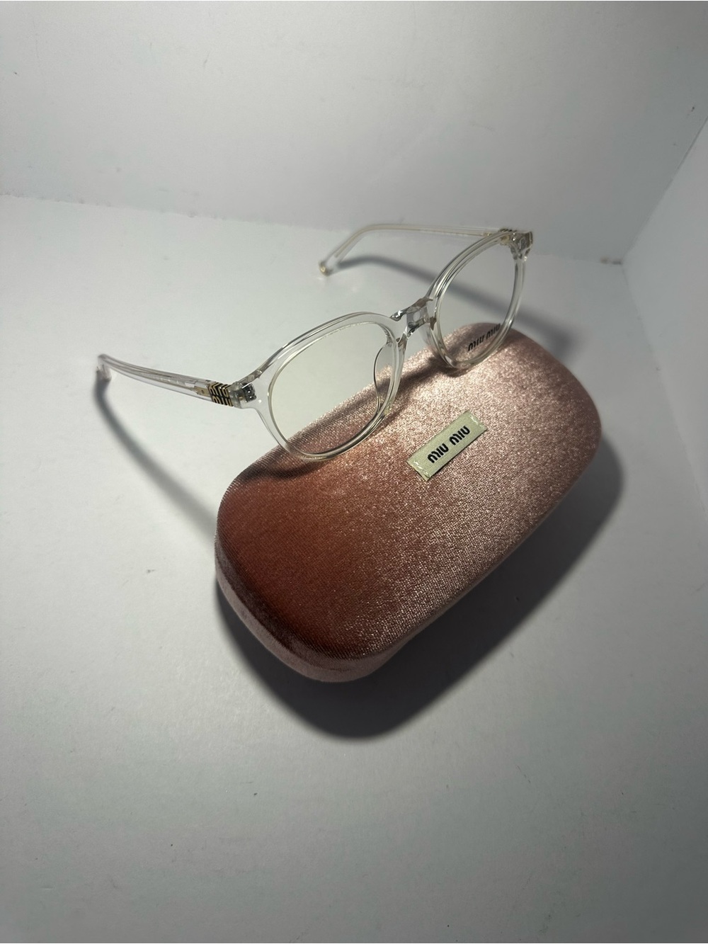Miu Miu Clear Round Eyeglasses with Pink Velvet Case